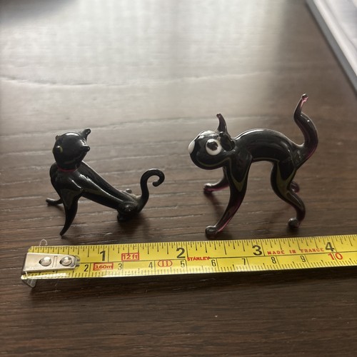 Two miniature black art glass - two,